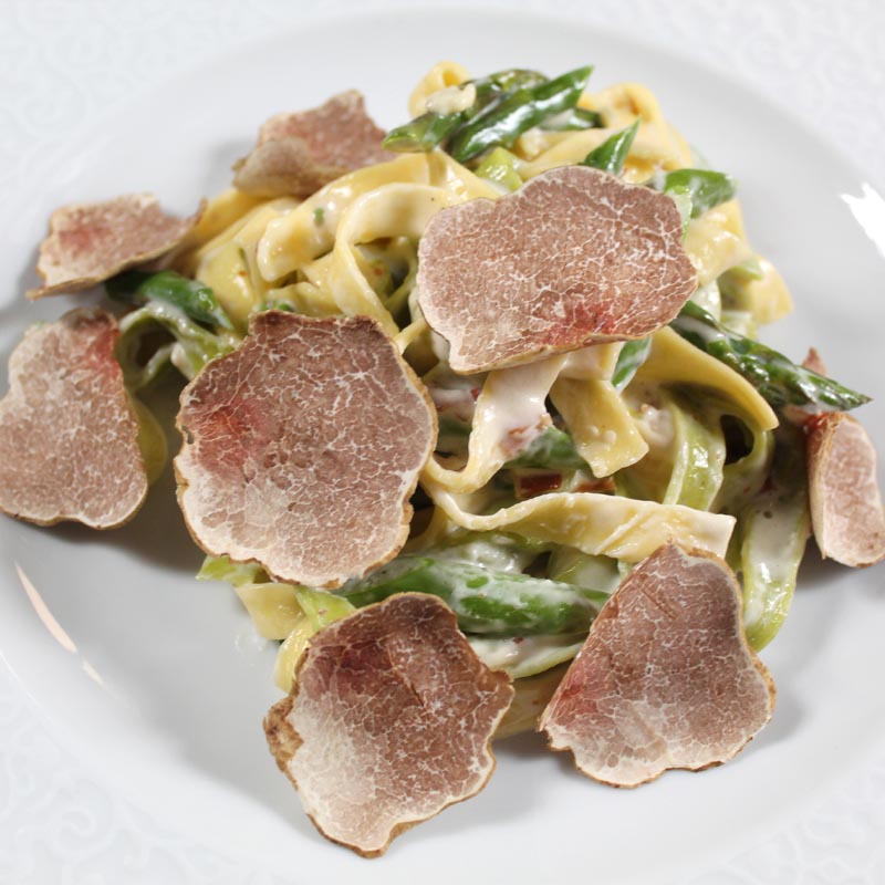 Truffle shaved over pasta