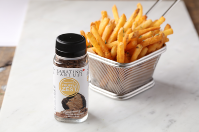 Truffle fries with Sabatino Truffles Truffle Zest in a wire container