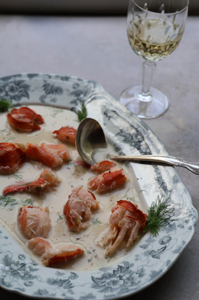 Lobster in Champagne Truffle Butter Sauce