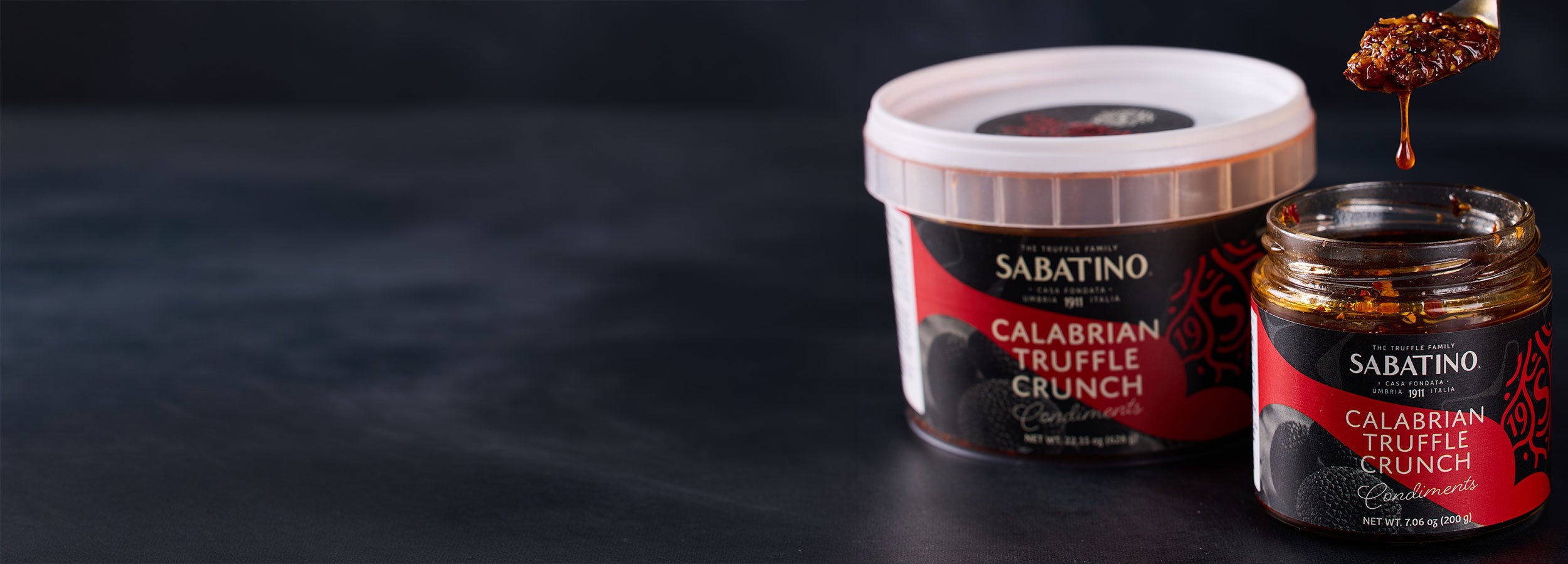 a container of food on a black surface