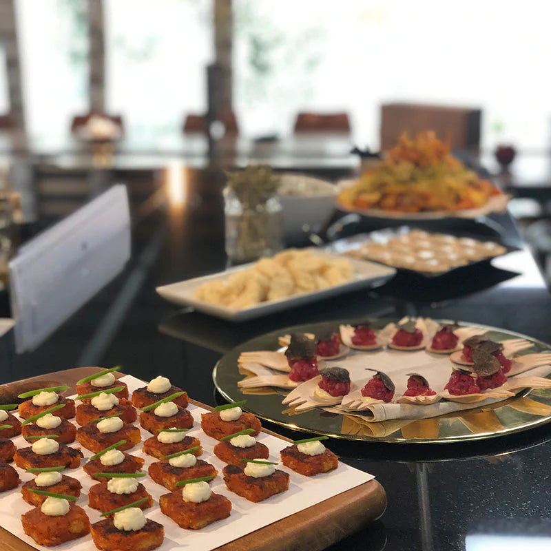 A selection of canapés on different trays